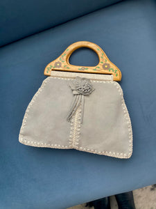 baby blue suede bag with painted wood handle