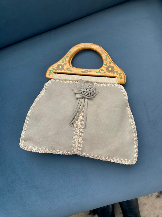 baby blue suede bag with painted wood handle