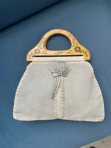 baby blue suede bag with painted wood handle